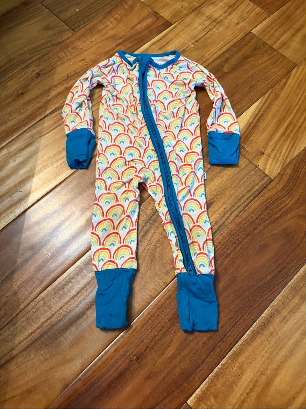 Baby little sleepies bamboo rainbow sleeper with blue trim. Size 0/3 months